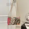 2026 Verano Nuevo Estilo Nacional Literario Floral Retro Elegante Bolso Cruzado de Cadena de un Hombro Tipo Sobre Tendencia al por Mayor Bolsos de Mujer