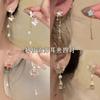 Clip para oreja de borla Super Hada Estrella para Mujer Aretes largos elegantes de lujo ligero ins nuevos nicho de celebridad de internet nuevos aretes combinan con todo