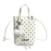 Bolso de mano nuevo de lunares, bolso para teléfono estampado, bolso de nicho estilo coreano, bolso de hombro de moda para el día a día para niñas, bolso cruzado