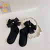 Calcetines para niñas estilo extranjero estilo princesa encaje exterior moda ins primavera y otoño bebé lazo una generación de pelo