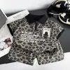 Conjunto de Verano para Niños 2026 Nuevo Elegante y Fresco Bebé Niños Estampado de Leopardo Manga Corta Conjunto de Dos Piezas Ropa de Moda