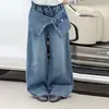 Pantalones vaqueros para niña 2026 primavera y otoño pantalones vaqueros acampanados pantalones vaqueros de retazos de moda y elegantes pantalones vaqueros holgados de pierna ancha