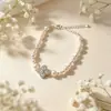 Pulsera de Trébol de Cuatro Hojas Rosa Morado Manta Perla Swarovski, Pulsera de Circonita Arcoíris de Lujo Ligero de Gama Alta, Venta al por mayor de Joyería de Nicho