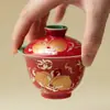 Gaiwan de Dos Piezas Color Rojo Dorado y Plateado Chino con Forma de Durazno Cerámica de Alto Valor Nuevo Estilo Chino Tazón de Té Juego de Té