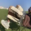 Novos shorts de verão estilo americano para homens, marca da moda, design fino, nicho, corte solto, tamanhos grandes, shorts casuais esportivos de cinco pontos