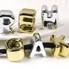 Chen Ming Acrílico Dorado Letras con Agujero Grande Cuentas para DIY Accesorios de Joyería Colgante de Bolsa Accesorios para Cadena de Teléfono Cuentas Sueltas