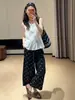 Traje de verão super estiloso: um conjunto completo de top sem mangas estilo coreano feminino e calça pantalona de bolinhas nove pontos conjunto de moda