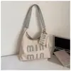 Tendência de Letras Retrô 2026 Feriado Nova Moda Personalidade Artística Elegante Texturizado Bolsa de Ombro Único Bolsa de Axila