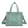 Bolso de hombro informal para mujer, bandolera sencilla y de color puro, bolso de nailon ligero, impermeable y versátil. Venta al por mayor.