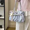Bolsa Feminina 2026 Primavera/Verão Nova Bolsa de Lona Casual Versátil Grande Capacidade Bolsa de Ombro Único Moda para o Dia a Dia Bolsa Tote