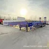 Fabricante Exporta Veículos de Transporte de Máquinas de Engenharia de Plataforma Baixa, Veículos de Transporte de Máquinas com Gancho e Corrente, Semirreboques de Plataforma Baixa com Escada Hidráulica