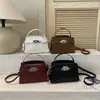 Bolsa Kelly Mini com Fivela de Metal e Textura Retrô Bolsa Quadrada Pequena de Temperamento Simples Bolsa de Ombro Versátil para o Dia a Dia Bolsa de Mão