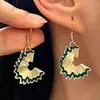 Pendientes de lápiz de aceite con forma de gota de color de contraste simple europeo y americano, pendientes femeninos creativos, frescos y divertidos, nuevos pendientes al por mayor
