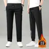 Calças casuais masculinas forradas com fleece para outono e inverno, calças retas estilo jogger, corte solto com bolsos, zíper, calças esportivas antifurto para homens