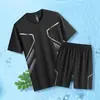 Novo Conjunto de Malha Respirável para Comércio Exterior para Homens, Camiseta de Manga Curta e Calça de Cinco Pontos de Verão, um Conjunto Esportivo Casual Estiloso