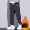 Calças casuais soltas com forro de fleece masculino, calças compridas de veludo cotelê de qualidade de exportação para outono e inverno, calças de moletom jogger quentes para comércio exterior, estilosas