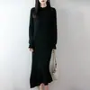 Vestido de Tricô Puro Lã 2026 Outono/Inverno Novo Gola Redonda Meia-Alta Manga Longa Feminino Bainha Torcida Vestido Longo