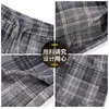 Pantalones de cuadros a bloques de color estilo retro casual 2026 de pierna ancha para hombres y mujeres, nuevos pantalones casuales versátiles de otoño e invierno de corte holgado estilo coreano de largo completo