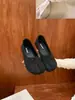 Zapatos planos retro de nicho estilo coreano con punta dividida y lazo 2026 nuevos zapatos de estilo de noche de gamuza tipo pezuña de cerdo y mocasines