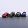 Llavero creativo de mini coche deportivo de fricción, coche de aleación con puertas que se abren, accesorio para mochila infantil, regalo de coche