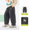 Pantalones nuevos para niños 2026 con pierna curva 2.0, pants deportivos unisex para primavera/otoño, corte 3D, holgados
