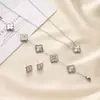 Colar de Trevo de Quatro Folhas com Patch Laser Ins Europeu e Americano Pulseira Dupla Face Feminina Brinco Versátil Conjunto de Brincos Acessível Luxo Fabricante Atacado