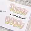 Linda vibra femenina, enérgica estilo ins, amarillo cremoso con lunares, gato francés ojo de gato iluminador, uñas postizas hechas a mano al por mayor