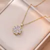 Colar Feminino Celebrante da Internet Giratório Amor Flor de Quatro Folhas Moda Novo Design de Nicho Sentido Pingente Vento Frio Colar de Aço Titânio