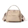 Bolso de mano de nailon de estilo coreano y japonés, nuevo para primavera-verano, multiusos, bandolera para viajes, compras y desplazamientos, bolso cruzado para hombre y mujer