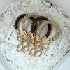 Cordón retráctil de silicona para teléfono, llavero corto de bobina para teléfono, cadena para teléfono, correa de muñeca, sensación de alta gama