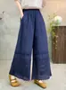 Estilo nuevo de verano estilo chica Mori artístico cintura elástica color liso diseño de retazos huecos pantalones rectos holgados versátiles al por mayor