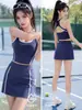 Top deportivo de bloques de color personalizado con tacto nude, espalda descubierta hermosa, falda deportiva de línea A de cintura alta, conjunto de fitness para exteriores