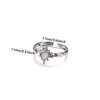 Anillo Geométrico Triangular de Zirconia Full Diamond Transfronterizo Europeo y Americano Anillo de Flor de Rosa Cruz Sol Anillo de Lujo Ligero para Mujer Venta al por Mayor