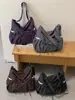 Bolso de hombro a cuadros retro estilo coreano, nueva moda 2026, con detalle de lazo, ofreciendo un look relajado y casual, adecuado para uso en exteriores