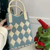 Bolso de Mano de Punto de Nuevo Estilo Color Dopamina Bolso de Almacenamiento Versátil de Nicho Bolso Pequeño de Punto Cruzado