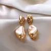 Pendientes de Perla Alienígena Barrocos 2024 Nuevas Explosiones Sentido del Diseño Nicho Pendientes Colgantes Retro Franceses de Alta Gama para Mujeres