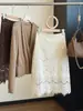 Elegante falda midi de encaje flocado estilo francés para mujer, nueva colección otoño 2026, de cintura alta, adelgazante, versátil y que se ajusta a la figura