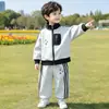 Conjunto de Roupa Esportiva Masculina Primavera e Outono Estilo Coreano Crianças Bonitas Modernas Casuais Conjunto de Duas Peças Roupas para Bebês e Crianças Pequenas Comércio Exterior