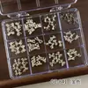 Juego de 12 Rejillas de Accesorios de Aleación Estilo Océano para Uñas Estrella de Mar Concha Mini Lazo Accesorios Portátiles para Uñas Oro y Plata