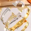 Versión Alta Pulsera de Acero Inoxidable Abierta Doble T Full Circonita Nueva para Mujer Estilo Europeo y Americano Lujo Ligero Pulsera Versátil sin Color Joyería