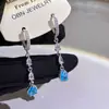 Brincos etéreos em forma de gota d'água azul marinho com diamantes, design de listras verticais, nicho de luxo leve, adequados para um encontro, brincos de estilo longo, modelo novo