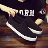 Zapatos de lona coreanos Primavera 2023 zapatos de trabajo para hombre todo negro verano transpirables casuales zapatillas de skate de moda talla grande comercio exterior