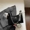 Bolso pequeño transfronterizo para mujer, nuevo modelo 2026, versátil y con sensación de alta gama, adecuado para ir al trabajo, popular bolso de hombro y cruzado, bolso tote de axila