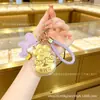 Oro puro 999 "Youqianhua" cadena para teléfono móvil de oro llavero colgante para bolso caja de regalo regalo pequeño promocional personalización cultural y creativa