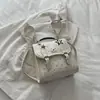 Mochila feminina simples multiuso, novo modelo outono 2026, estilosa e elegante, bolsa de ombro duplo e de ombro único, bolsa de mão da moda para o dia a dia