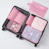 Set de bolsas de almacenamiento de viaje de siete piezas, bolsas impermeables, resistentes al desgaste y al polvo para organizar y guardar ropa interior, ropa y equipaje