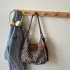 Bolso tote popular de estampado de leopardo estilo coreano diseño de nicho transfronterizo para mujer, gran capacidad, tendencia retro, bolso de un solo hombro, bolso de viaje
