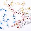 Paquete de árbol de Navidad de una pieza accesorios 7CM muleta pequeña de plástico colgante decorativo en stock venta al por mayor