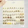 Venta Caliente Transfronteriza 30 Pares de Aretes, Aretes de Flor, Juego Combinado de Aretes, Aretes de Lujo Ligero, Aretes Sencillos de Aleación al por Mayor