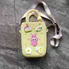 Monedero de silicona con forma de cueva cuadrada para niños, bolso cruzado para caminar, divertido y bonito bolso de silicona para cambio.